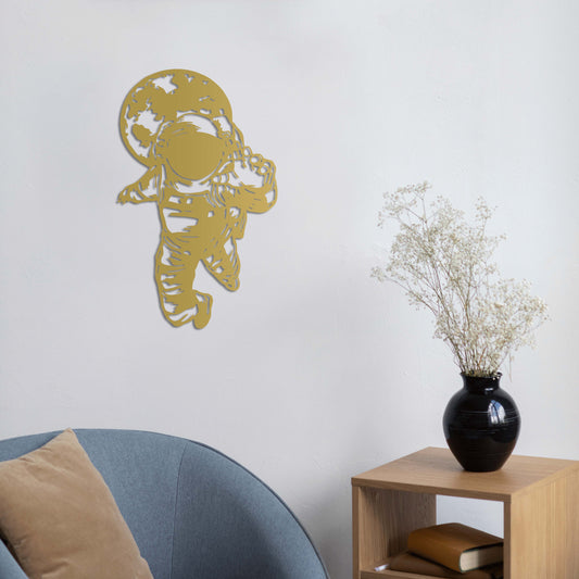 Handcrafted space-themed decorative sculpture featuring astronaut